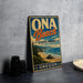 A vintage-style metal sign for Oona Beach State Park in Oregon, featuring a scenic beach landscape with mountains in the background.