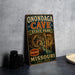 A vintage-style metal sign for Onondaga Cave State Park in Missouri, featuring an illustration of the cave and the text "Onondaga Cave State Park" and "Missouri".