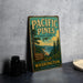 A vintage-style sign for Pacific Pines State Park, featuring a scenic illustration of the park's natural surroundings.