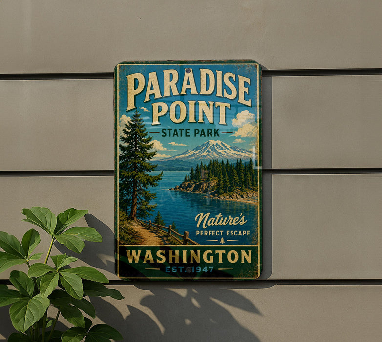 A vintage-style sign for Paradise Point State Park in Washington, featuring a scenic landscape with a mountain, pine trees, and a body of water.