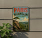 A vintage-style metal sign for Paris Mountain State Park in South Carolina, featuring a scenic landscape with a mountain, trees, and a lake.