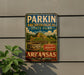 A vintage-style sign for Parkin Archeological State Park in Arkansas, featuring a landscape with a hill, a pot, and a sign that says "Explore Arkansas".