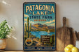 A vintage-style metal sign for Patagonia Lake State Park in Arizona, featuring a scenic landscape with mountains, a lake, and a cactus.