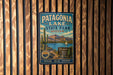 A vintage-style metal sign for Patagonia Lake State Park in Arizona, featuring a desert landscape with a cactus and mountains in the background.