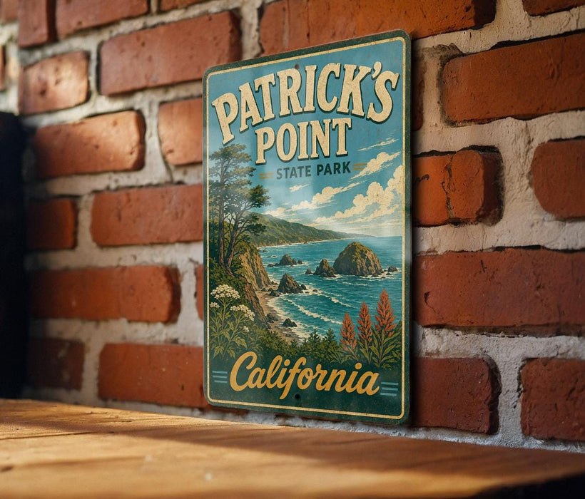 A vintage-style metal sign for Patrick's Point State Park in California, featuring a scenic coastal landscape with rocky cliffs, a beach, and a body of water.