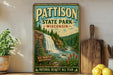 A vintage-style sign for "Pattison State Park" in Wisconsin, featuring a waterfall and forest scenery.