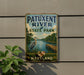 A metal sign on a wall that reads "Patuxent River State Park Maryland".