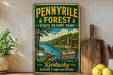 A vintage-style sign for Pennyville Forest State Resort Park in Kentucky, featuring a scenic illustration of the park's natural surroundings.