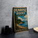 A vintage-style sign for Penrose Point State Park in Washington, featuring a scenic landscape with a mountain, trees, and a sailboat on the water.