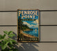 A vintage metal sign for Penrose Point State Park in Washington, featuring a scenic landscape with a mountain, pine trees, and a sailboat on the water.