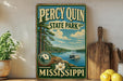 A vintage-style sign for Percy Quinn State Park in Mississippi, featuring a scenic image of a lake with a boat and pine trees.