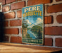 A vintage-style metal sign for the state park of Illinois, featuring a scenic landscape with a river, mountains, and trees.