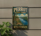 A vintage metal sign for Perrot State Park in Wisconsin, featuring a scenic landscape with a river, mountains, and a sailboat.