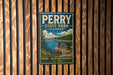 A vintage-style metal sign for Perry State Park in Kansas, featuring a scenic landscape with a lake, mountains, and a waterfall.