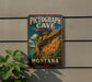 A vintage-style sign for Pictograph Cave, a state park in Montana, featuring an illustration of the cave and its surroundings.