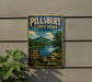 A vintage metal sign for Pillsbury State Park in New Hampshire, featuring a scenic landscape with mountains, trees, and a lake.