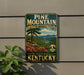 A vintage-style sign for Pine Mountain State Resort Park in Kentucky, featuring a scenic landscape with mountains, trees, and a lake.