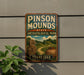 A vintage-style sign for Pinson Mounds State Archaeological Park in Tennessee, featuring an illustration of a bird and a pottery piece.