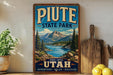 A vintage-style sign for Pute State Park in Utah, featuring a scenic mountain landscape with a lake and pine trees.
