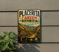 A vintage-style metal sign for Placerita Canyon State Park, California, mounted on a wall.
