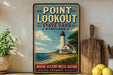 A vintage-style sign for Point Lookout State Park in Maryland, featuring a lighthouse and a beach scene.