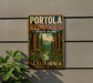 A vintage-style metal sign for Portola Redwoods State Park in California, featuring a scenic illustration of the park's forest and a river.