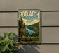 A vintage-style metal sign for Potlatch State Park, featuring a scenic landscape with a river and pine trees, mounted on a wall.