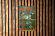 A vintage metal sign for Pumpkin Hill Creek Preserve in Florida, featuring a scenic illustration of a park and a lake.