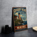 A vintage-style metal sign for Quoddy Head State Park in Maine, featuring a lighthouse and coastal landscape.