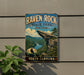 A vintage-style sign for Raven Rock State Park in North Carolina, featuring a scenic mountain landscape with a river and a cliff.