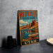 A vintage-style metal sign for Red Fleet State Park in Utah, featuring a scenic illustration of a lake and mountains.