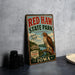 A vintage-style metal sign for Red Haw State Park in Iowa, featuring a hawk perched on a tree branch and the text "Nature Awaits!"