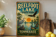 A vintage-style sign for Reelfoot Lake State Park in Tennessee, featuring illustrations of birds and a sunset over the lake.
