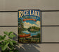 A vintage-style sign for Rice Lake State Park in Minnesota, featuring a scenic image of a lake with a canoe and pine trees.