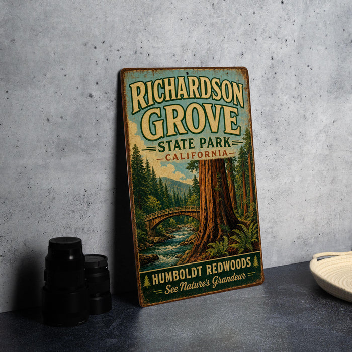 A vintage-style metal sign for Richardson Grove State Park in California, featuring a scenic illustration of a forest with a bridge and a river.
