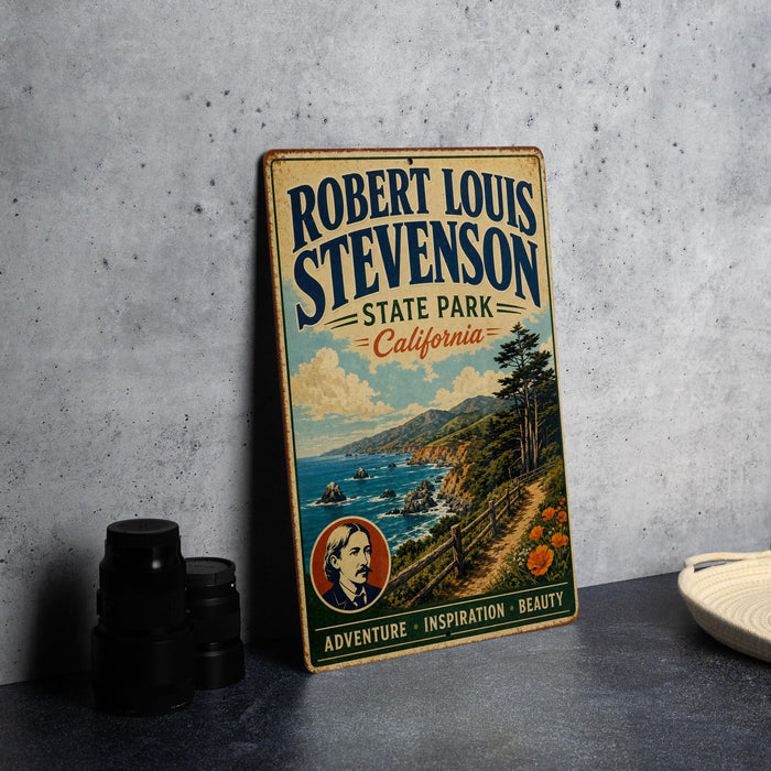 A vintage-style metal sign for Robert Louis Stevenson's State Park in California, featuring a scenic landscape with mountains, a beach, and a lighthouse.