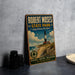 A vintage-style metal sign for Robert Moses State Park, featuring a lighthouse and beach scene, is displayed on a gray countertop next to a stack of black camera lenses.