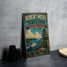 A vintage-style metal sign for Robert Moses State Park, New York, featuring a scenic image of a boat on a lake surrounded by mountains.