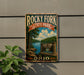 A vintage-style sign for Rocky Fork State Park in Ohio, featuring a scenic landscape with a lake and forest.