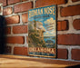 A vintage-style metal sign for Roman Nose State Park in Oklahoma, featuring a scenic image of the park's cliffs and landscape.