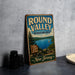 A vintage-style metal sign for the Round Valley Recreation Area in New Jersey, featuring a scenic image of a lake and mountains.