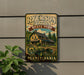 A vintage-style metal sign for Ryserson Station State Park in Pennsylvania, featuring a scenic illustration of a cabin surrounded by nature.