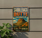 A vintage-style metal sign for Saddleback Butte State Park in California, featuring a mountain landscape with flowers.