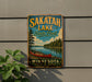 A vintage-style metal sign for Sakatah Lake State Park in Minnesota, featuring a canoe and a scenic landscape.