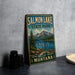 A vintage-style metal sign for Salmon Lake State Park in Montana, featuring a scenic landscape with mountains, a lake, and a fish.