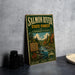 A vintage-style sign for the Salmon River State Forest in Connecticut, featuring a scenic illustration of the forest and a river.