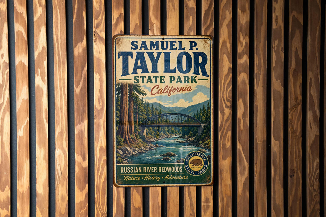 A vintage metal sign for Samuel P. Taylor State Park in California, featuring a scenic illustration of the Russian River and Redwood forests.