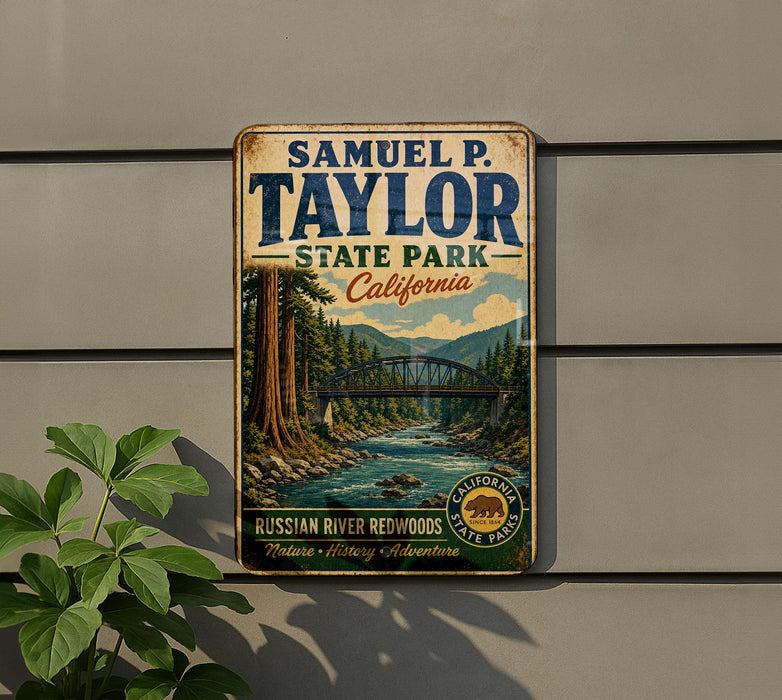 A vintage-style metal sign for Samuel P. Taylor State Park in California, featuring a scenic illustration of the Russian River and Redwood forests.