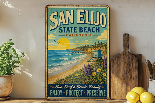 A vintage-style metal sign for San Elijo State Beach, California, featuring a beach scene with a lifeguard tower and a sunset over the ocean.
