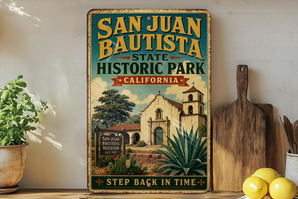 A vintage-style sign for San Juan Bautista State Historic Park in California, featuring an illustration of a historic building and a cactus plant.